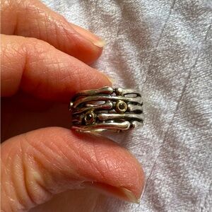 Sterling silver ring with gemstones.